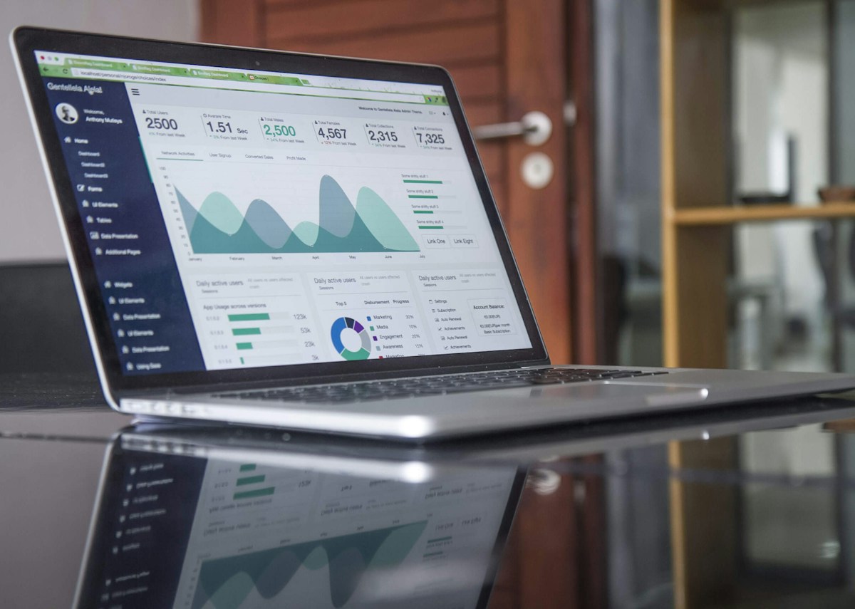 Digital marketing metrics on a laptop informing customer journeys and campaign timing