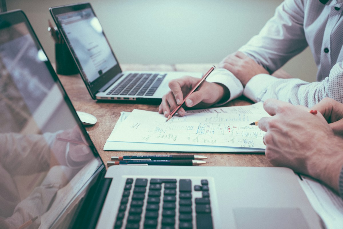 Business planning materials connecting analysis, objectives and implementation priorities