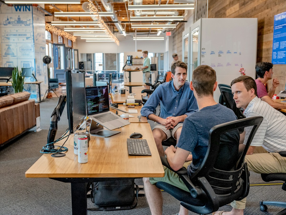 Multidisciplinary team connecting business strategy with design and engineering decisions